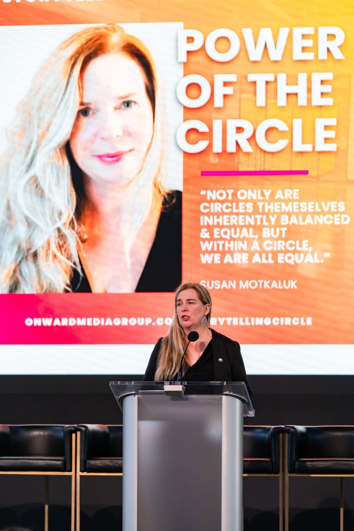 Susan Motkaluk speaking beneath the Power of the Circle slide